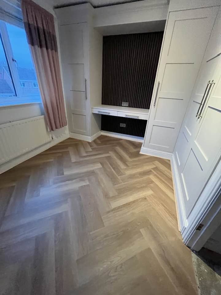 Bespoke fitted wardrobes with a built-in dressing table and a stylish oak flooring! review project photo